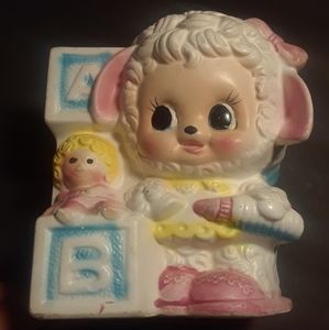 Anthropogenic lamb and baby doll vintage planter